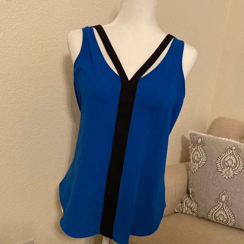 Sleeveless blouse, size M by Candie’s in a blue color